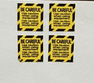 Decal 1/16 Be Careful yellow 5/16in. x 5/16in. DX706